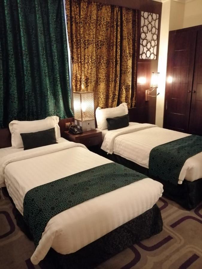 Rawdat Al Safwa Hotel Medina Bagian luar foto